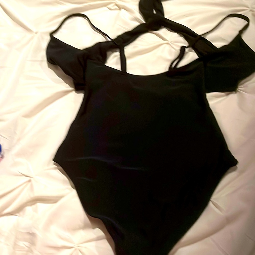 Brand new one piece black bathing suit